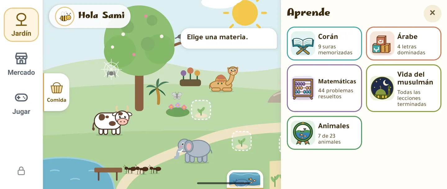 El cajón Aprende abierto sobre el jardín, con una ficha para Corán, Árabe, Matemáticas, Vida del musulmán y Animales, cada una con el progreso del niño